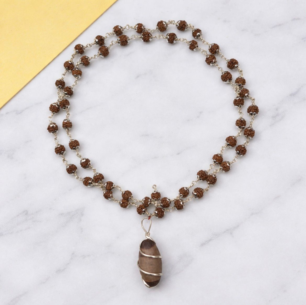 5 mukhi Rudraksha silver cap mala with narmadeshvar pendent