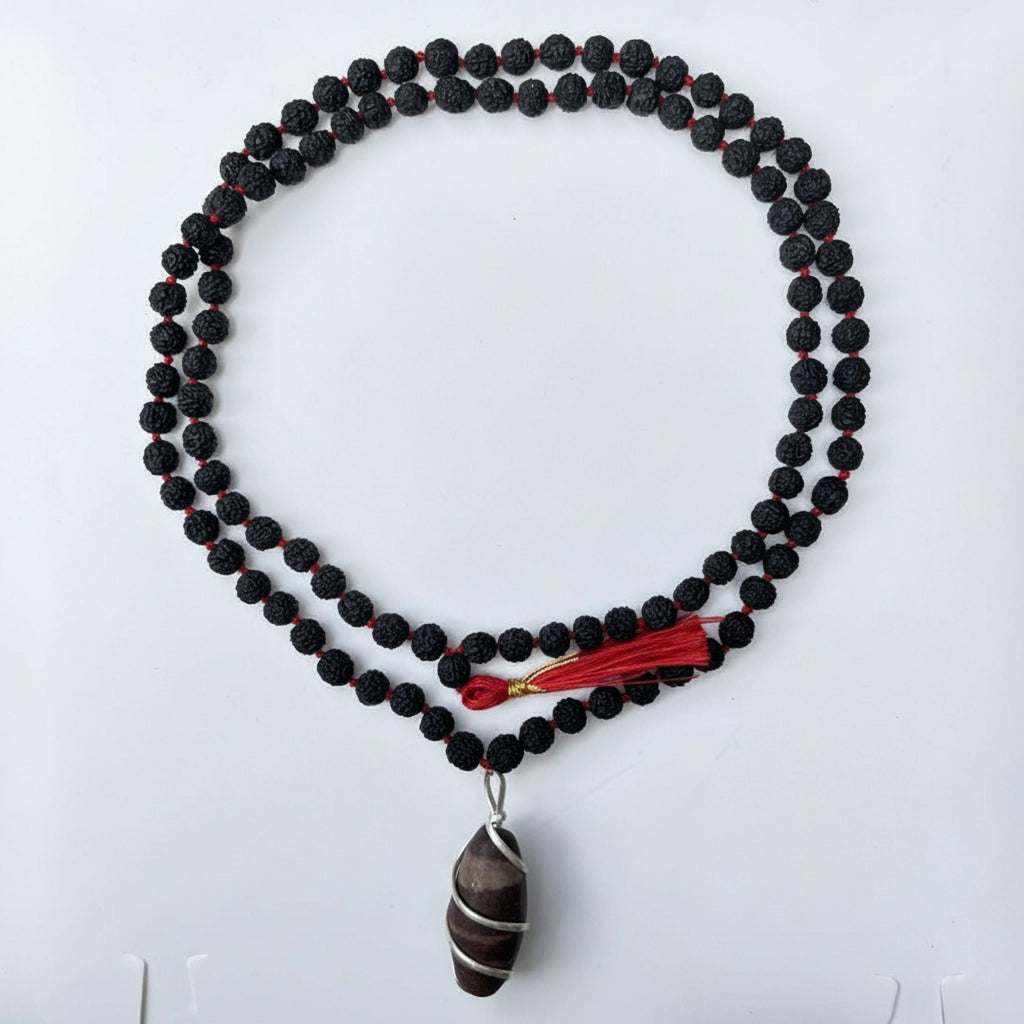 Kashivardan Black Rudraksha Mala with Silver Wire Wrapped Narmadeshwar Stone Pendant | 8mm Natural Beads | Blessed and Purified with Gangajal | Idol for Mens & Womens | Meditation & Pooja